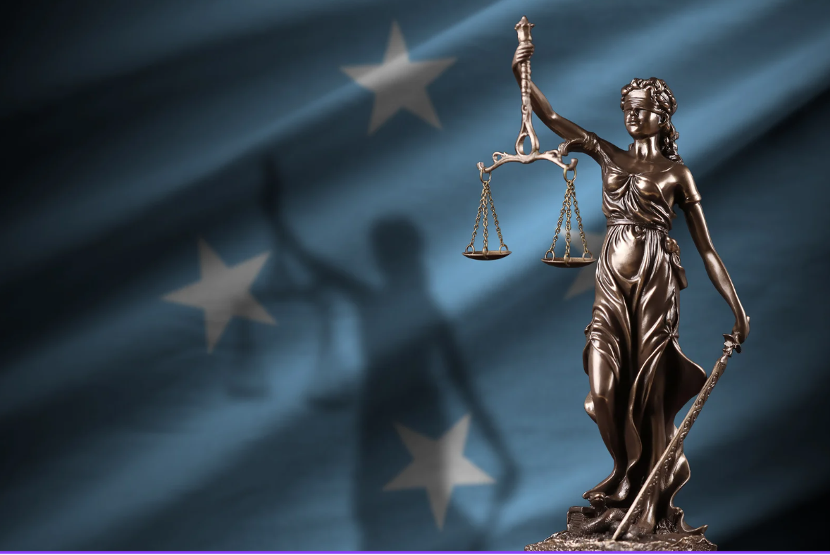 fru Justitia og rettferdighetens gudinne.